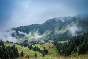 Mountain landscape with low clouds and fog Mountain landscape with low clouds and fog
